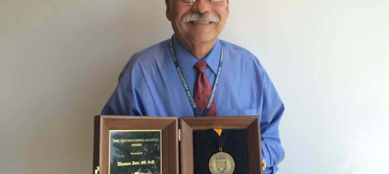 Dr. Tom Inui with Johns Hopkins University distinguished alum award