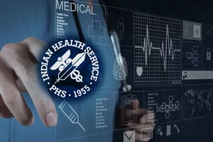image of a doctor using electronic health record overlaid with IHS logo