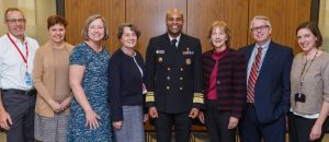 IU Center for Global Health staff and faculty pose with US Surgeon General Dr. Jerome Adams