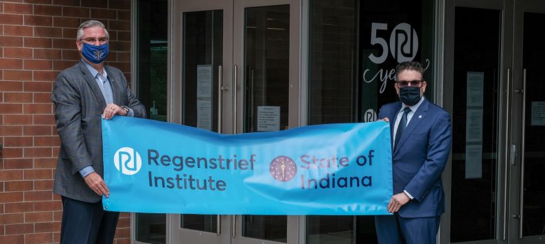 Dr. Embi with Gov. Holcomb to honor Regenstrief during September 2020