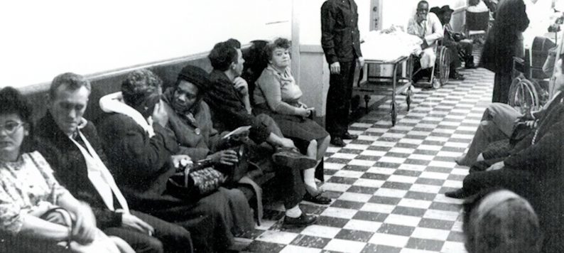 Marion County General waiting room full of Black and white patients, an area that Sam Regenstrief sough to improve