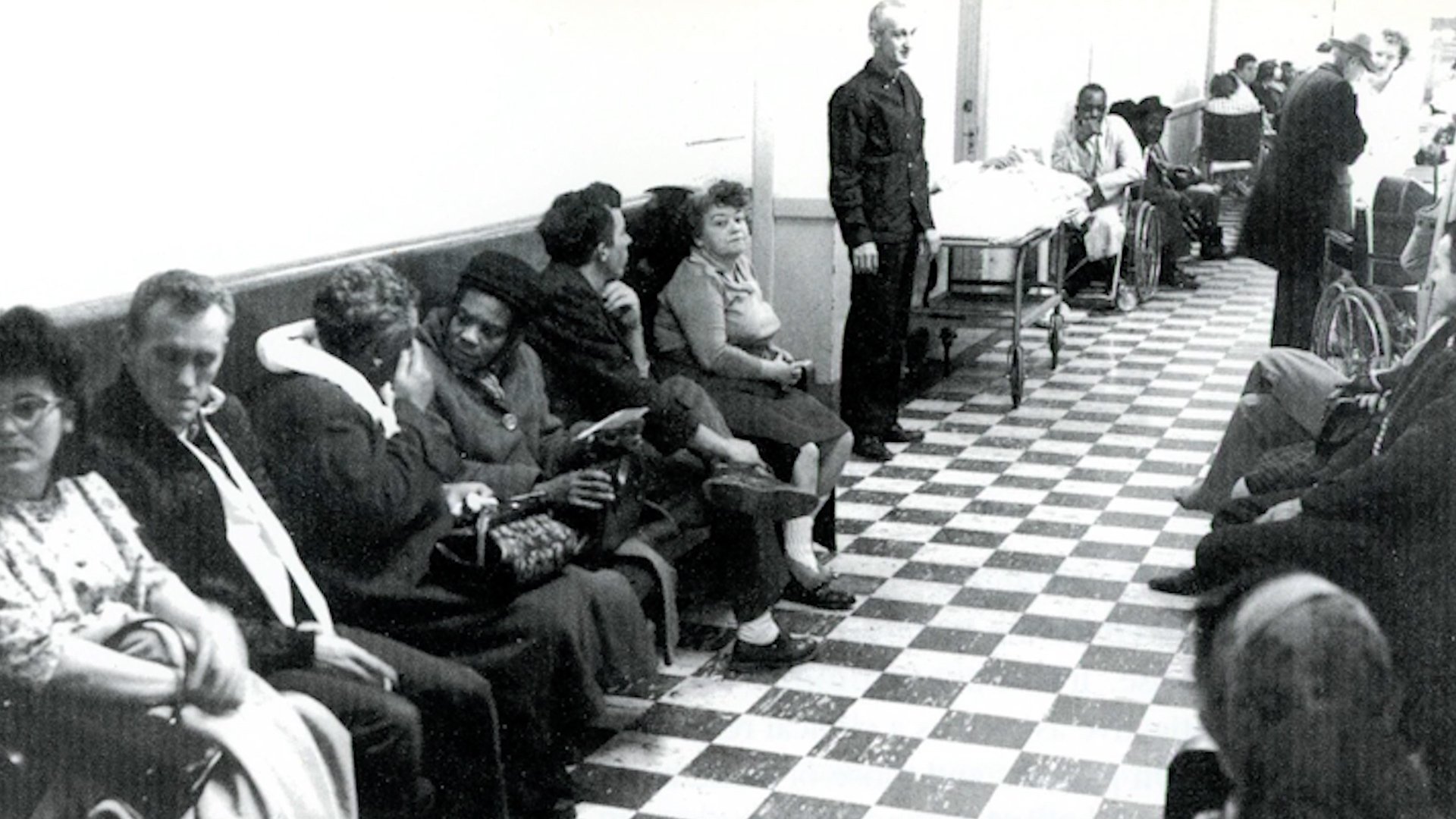 Marion County General waiting room full of Black and white patients, an area that Sam Regenstrief sough to improve