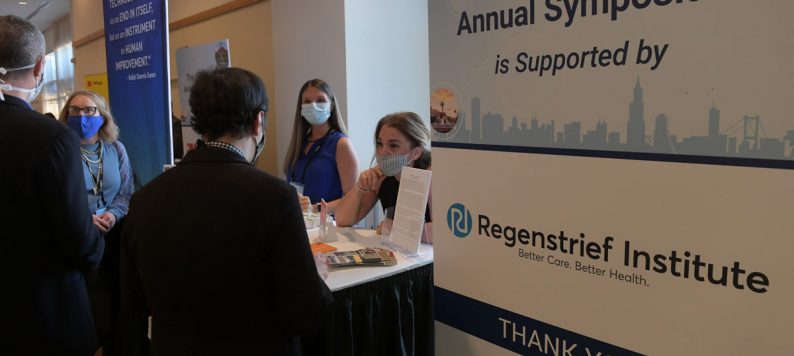 People at Regenstrief Institute booth at AMIA 2021 Annual Symposium
