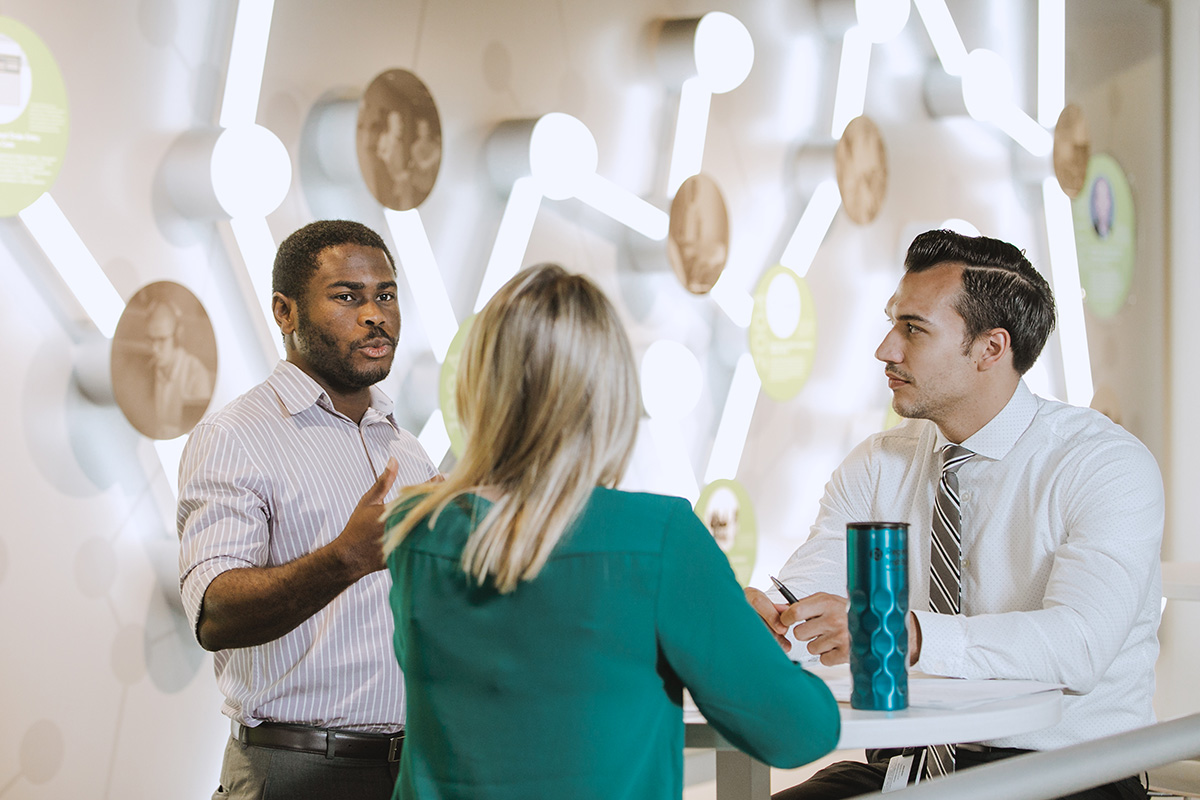 Staff members chatting in a collaborative space