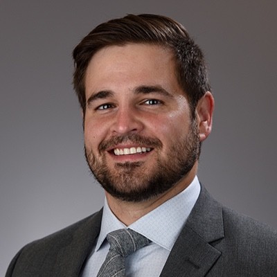 Travis Johnson, PhD