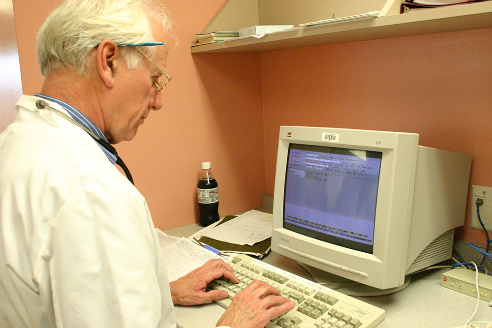 Clem McDonald at the computer